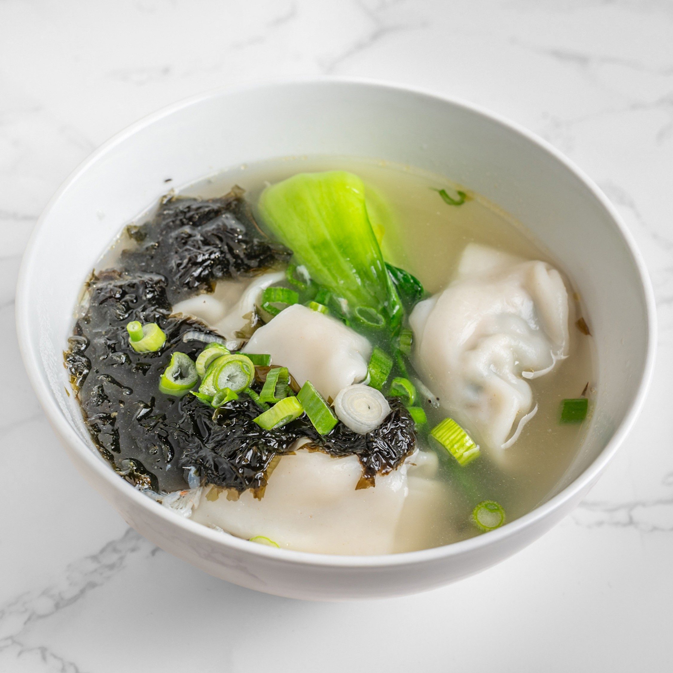 荠菜大馄炖 / Pork and Vegetable Wonton Soup.