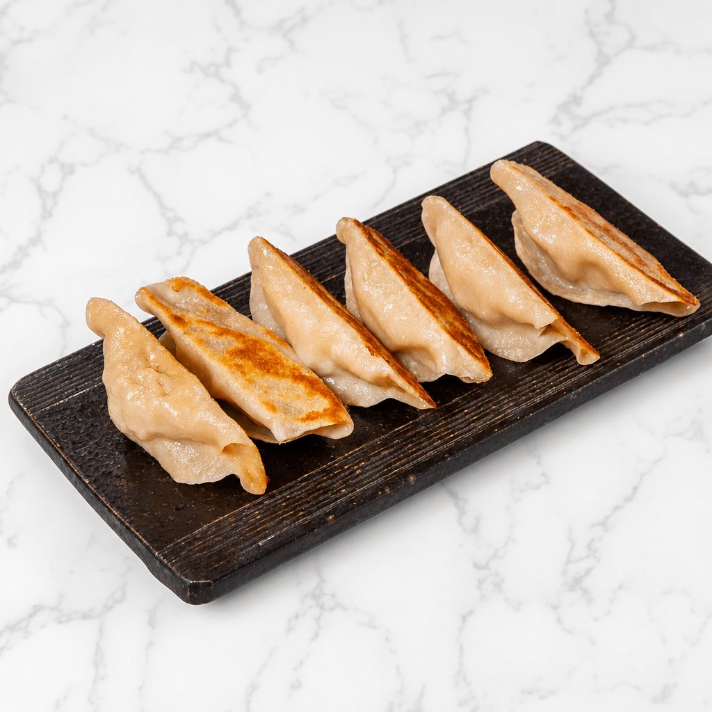 开口锅贴 / Pan Fried Pork Dumplings.