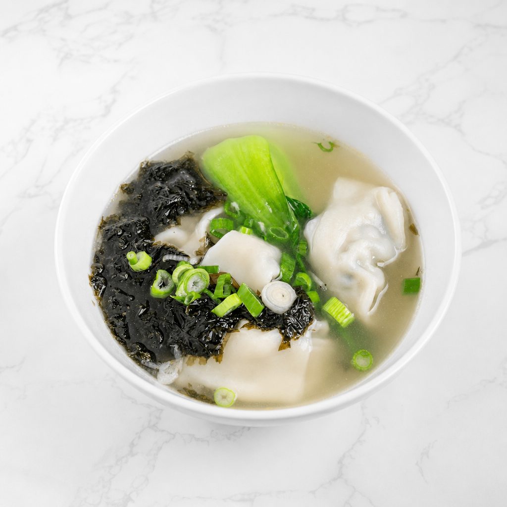 荠菜大馄炖 / Pork and Vegetable Wonton Soup.