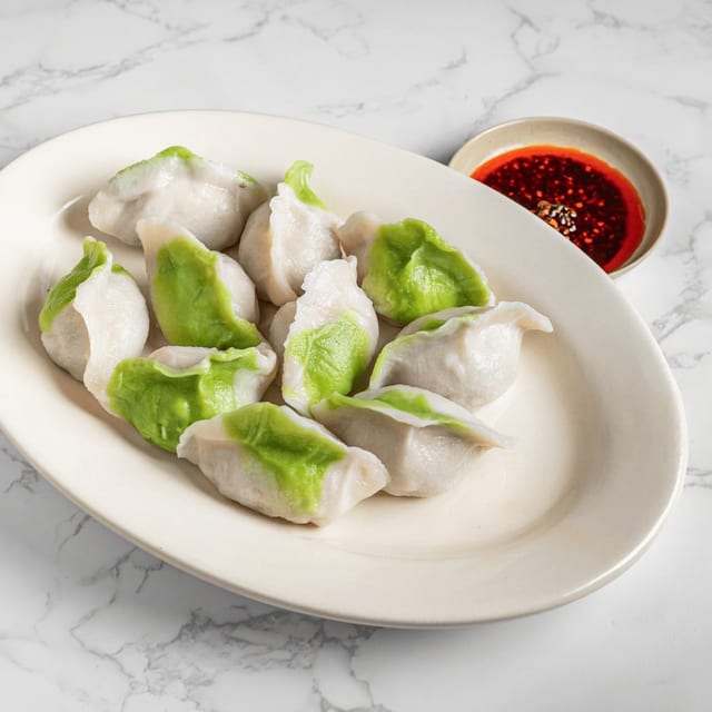 G8. Pork, Shrimp, and Chive Dumplings.
