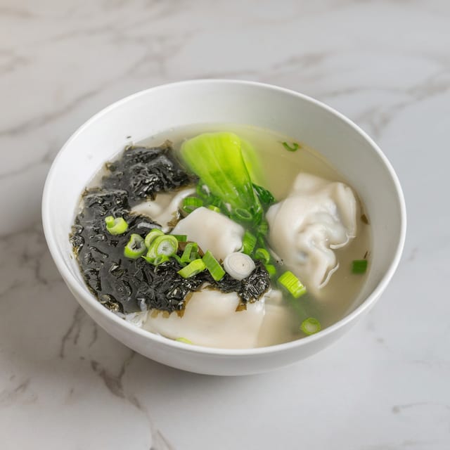 荠菜大馄饨 / Pork and Vegetable Wonton Soup.